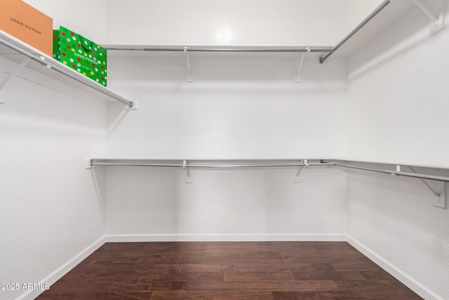 4215 W Hackamore Dr, Phoenix, AZ 85083 - walk in closet featuring dark wood-type flooring