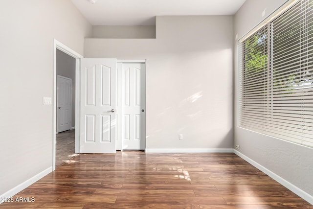 4215 W Hackamore Dr, Phoenix, AZ 85083 - unfurnished bedroom featuring wood finished floors and baseboards