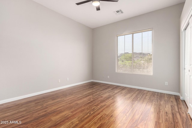 4215 W Hackamore Dr, Phoenix, AZ 85083 - unfurnished room featuring wood finished floors, a ceiling fan, and baseboards