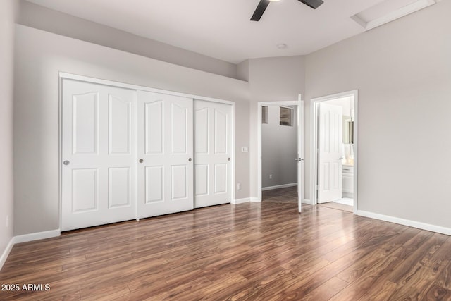 4215 W Hackamore Dr, Phoenix, AZ 85083 - unfurnished bedroom with wood finished floors, baseboards, a closet, a ceiling fan, and ensuite bathroom