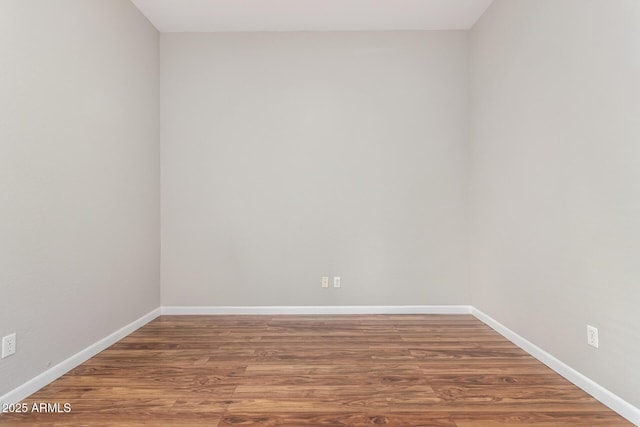 4215 W Hackamore Dr, Phoenix, AZ 85083 - empty room featuring baseboards and wood finished floors