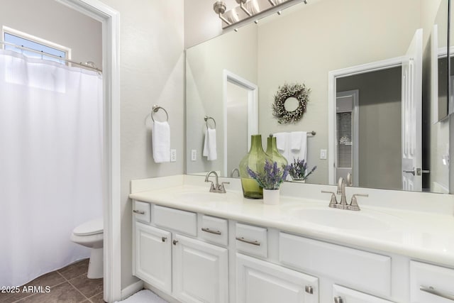 4215 W Hackamore Dr, Phoenix, AZ 85083 - bathroom with double vanity, toilet, tile patterned flooring, and curtained shower