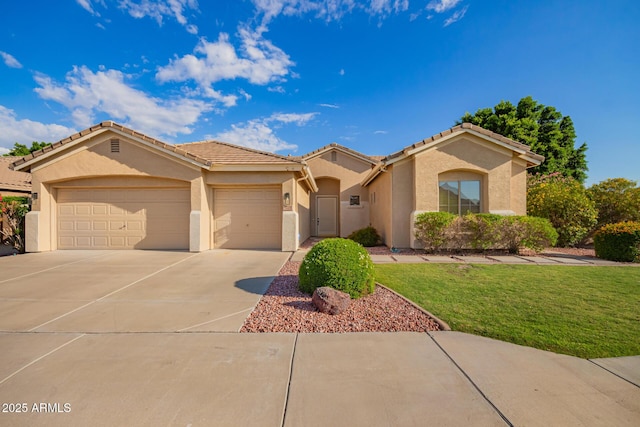 4215 W Hackamore Dr, Phoenix, AZ 85083 - mediterranean / spanish home with an attached garage, stucco siding, concrete driveway, and a front lawn
