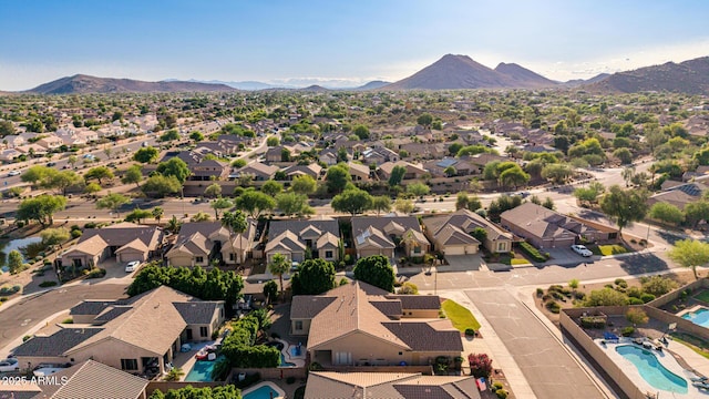 4215 W Hackamore Dr, Phoenix, AZ 85083 - aerial perspective of suburban area featuring a pool and a mountain backdrop
