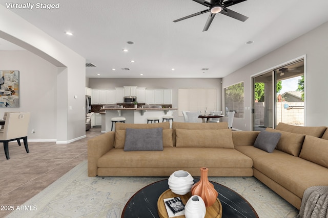 4215 W Hackamore Dr, Phoenix, AZ 85083 - living area featuring a ceiling fan, recessed lighting, baseboards, and light tile patterned flooring