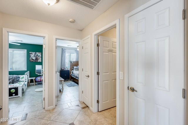 hallway with visible vents