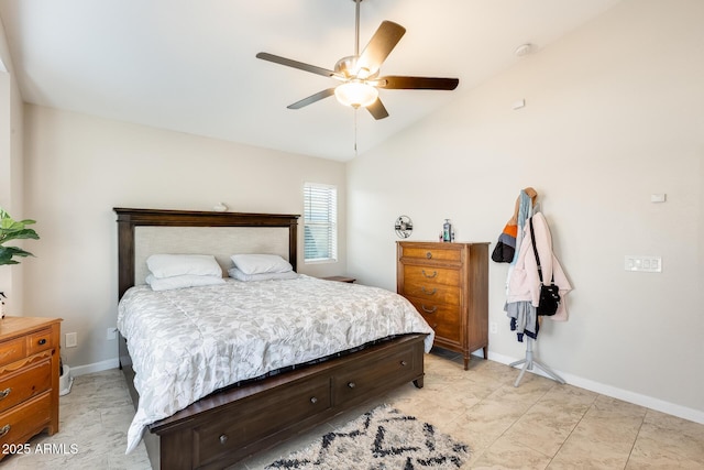 bedroom with baseboards, lofted ceiling, and a ceiling fan