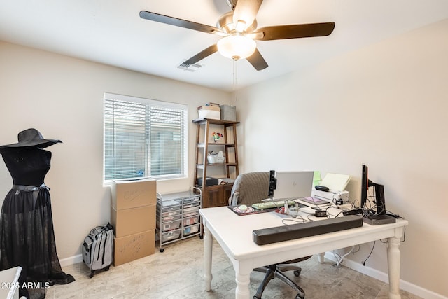 home office featuring visible vents, baseboards, and a ceiling fan