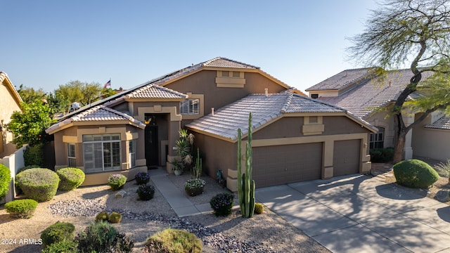 view of front of property featuring a garage