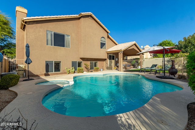 view of swimming pool with a patio