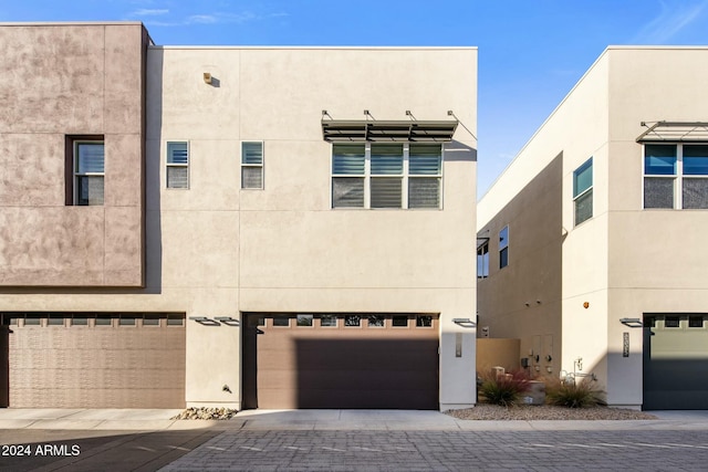 view of front of property featuring a garage