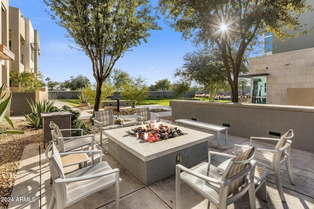 view of patio / terrace with a fire pit