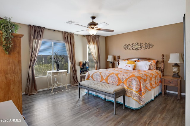 bedroom featuring dark wood-type flooring and ceiling fan