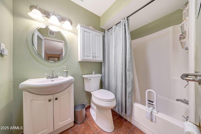 bathroom with vanity, shower / bath combo with shower curtain, tile patterned floors, and toilet