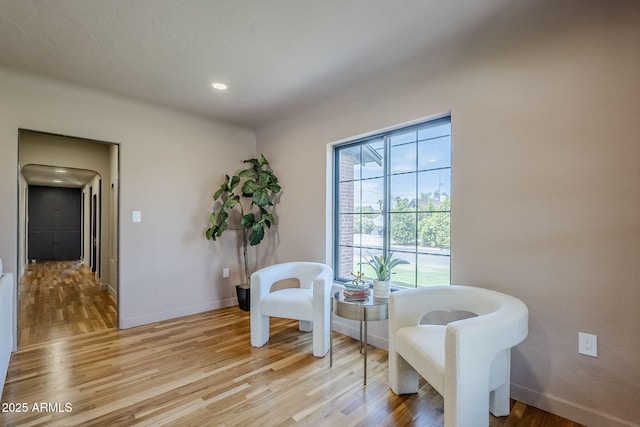 1551 W Vernon Ave, Phoenix, AZ 85007 - living area featuring light wood-style flooring, baseboards, and recessed lighting