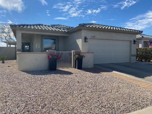 view of front of property with a garage