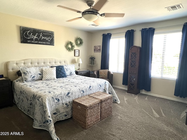 bedroom with visible vents, carpet, ceiling fan, and baseboards