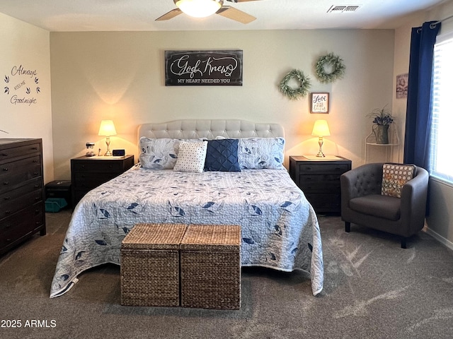 bedroom with carpet floors, a ceiling fan, and visible vents