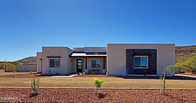 view of front of home with a front yard