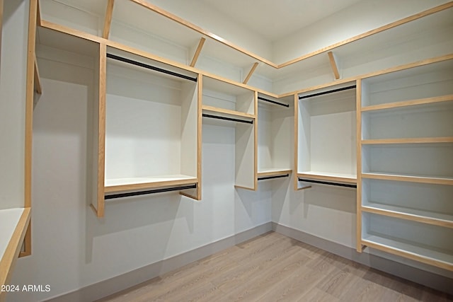 walk in closet featuring light wood-type flooring