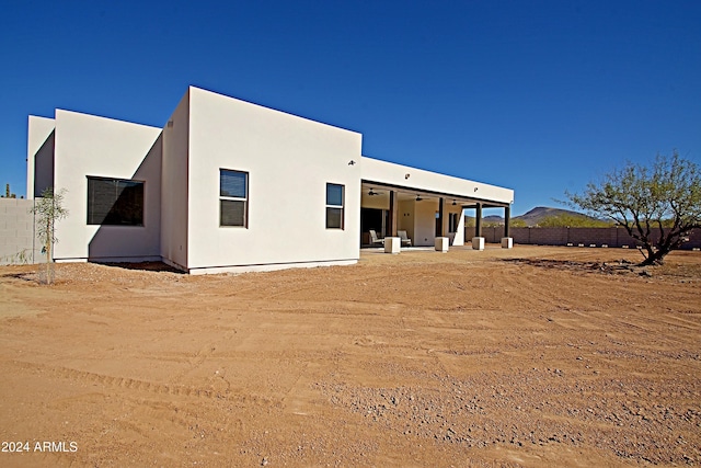 rear view of house featuring a patio area