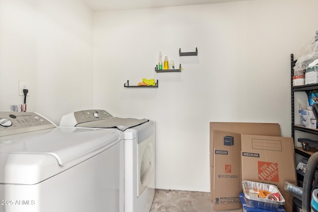 washroom with laundry area and washing machine and clothes dryer