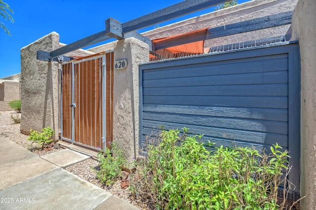 620 S Allred Dr, Tempe, AZ 85288 - view of home's exterior with a gate