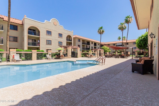 10330 W Thunderbird Blvd Unit C109, Sun City, AZ 85351 - community pool featuring a patio