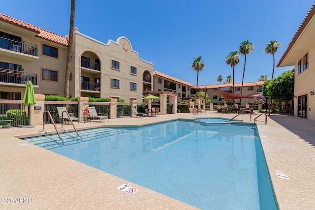 10330 W Thunderbird Blvd Unit C109, Sun City, AZ 85351 - view of pool with a pool with connected hot tub