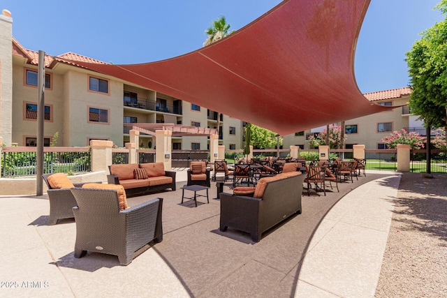 10330 W Thunderbird Blvd Unit C109, Sun City, AZ 85351 - view of community with an outdoor living space, a pergola, and a patio
