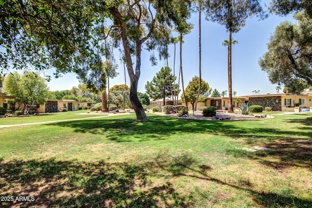 10330 W Thunderbird Blvd Unit C109, Sun City, AZ 85351 - view of home's community featuring a lawn