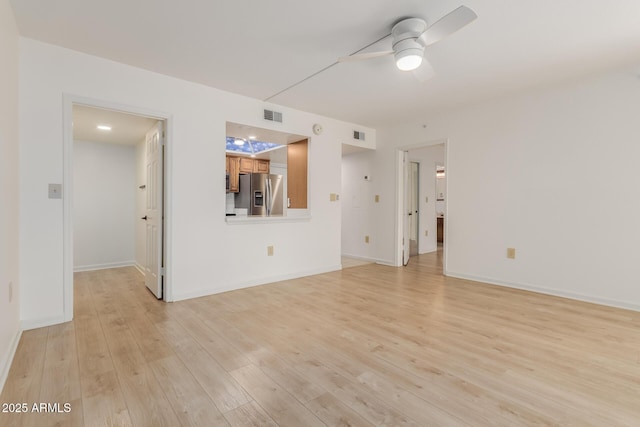 10330 W Thunderbird Blvd Unit C109, Sun City, AZ 85351 - unfurnished living room with ceiling fan and light wood-type flooring