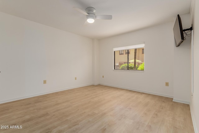 10330 W Thunderbird Blvd Unit C109, Sun City, AZ 85351 - spare room featuring light wood finished floors and a ceiling fan