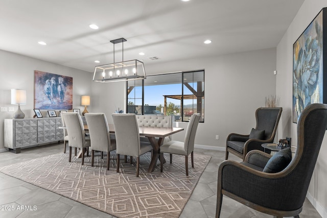 tiled dining room featuring baseboards, an inviting chandelier, visible vents, and recessed lighting