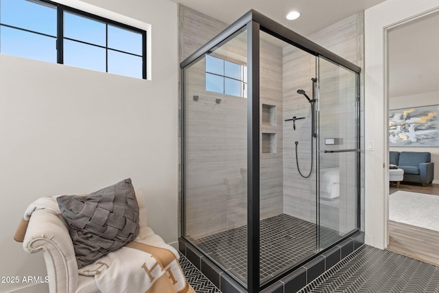 full bathroom featuring a stall shower, wood finished floors, and recessed lighting