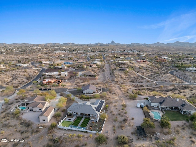 birds eye view of property with a residential view and a mountain view