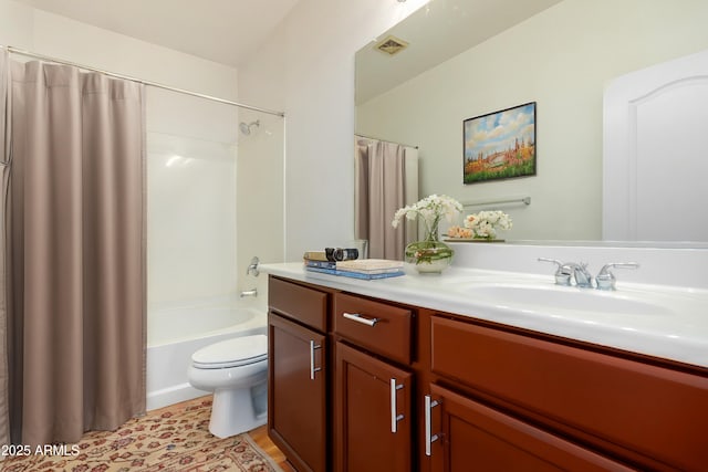 full bathroom with vanity, toilet, and shower / bath combo