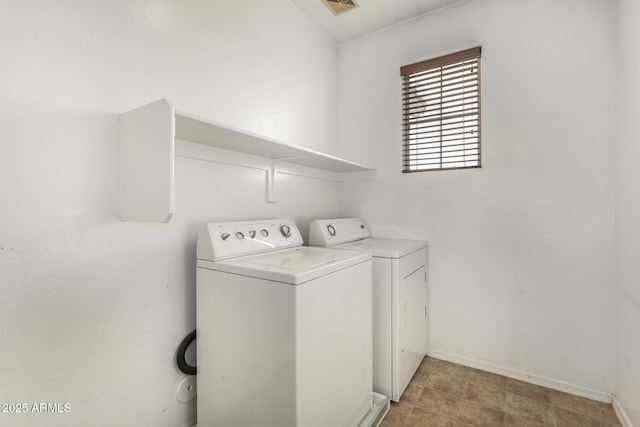 laundry room with washer and dryer