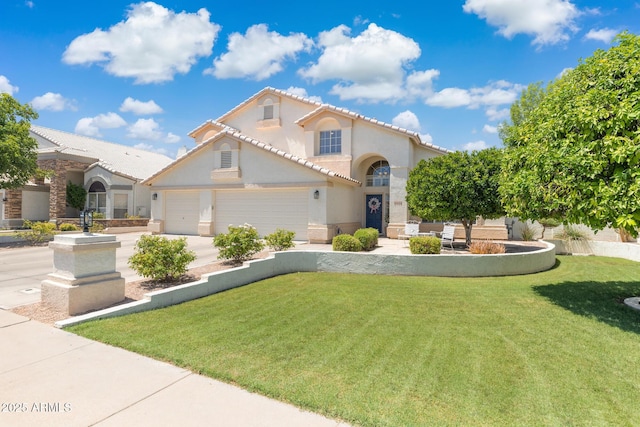 2258 N Gentry, Mesa, AZ 85213 - mediterranean / spanish house featuring a front yard, an attached garage, stucco siding, driveway, and a tile roof