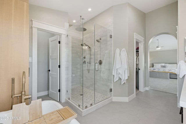 2258 N Gentry, Mesa, AZ 85213 - ensuite bathroom with ceiling fan, a stall shower, a tub to relax in, a spacious closet, and recessed lighting