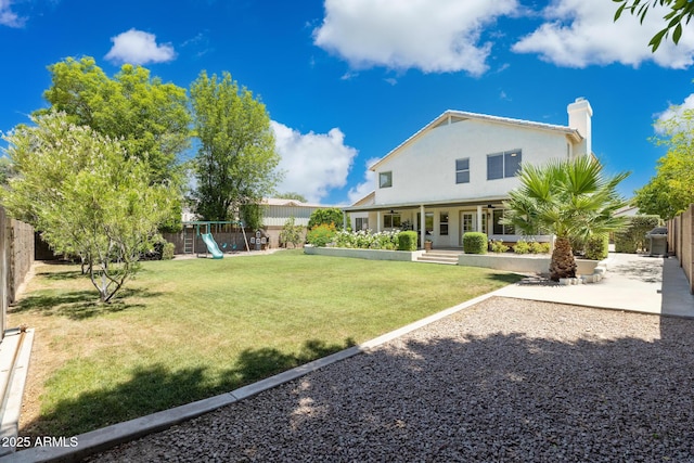 2258 N Gentry, Mesa, AZ 85213 - fenced backyard with ceiling fan and covered porch
