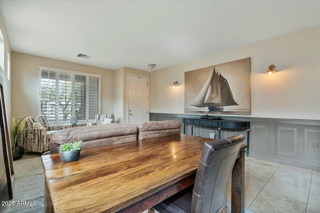 view of tiled dining space