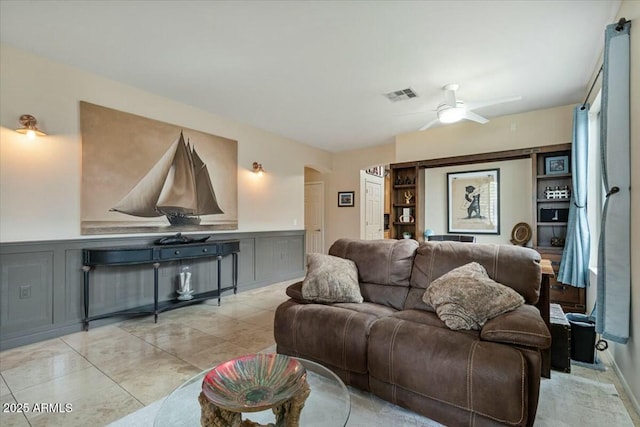 living room with ceiling fan