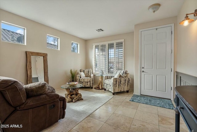 sitting room featuring light tile patterned flooring