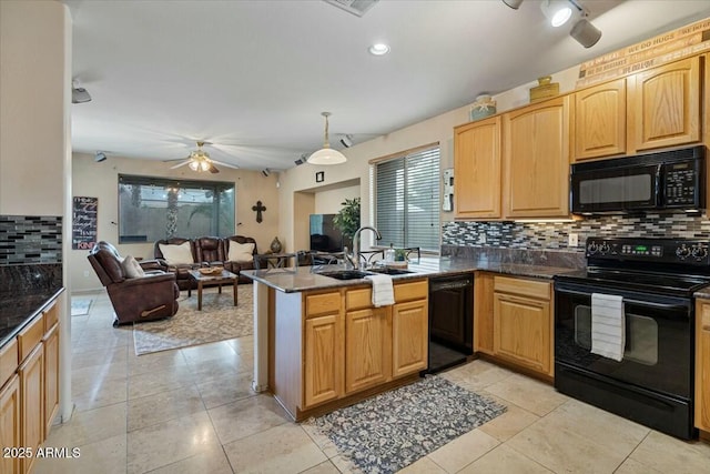 kitchen with black appliances, sink, hanging light fixtures, kitchen peninsula, and light tile patterned flooring