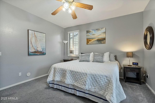 bedroom with ceiling fan and dark colored carpet