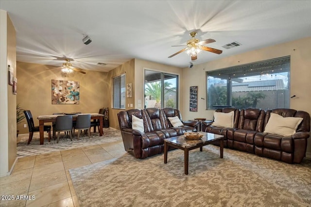 living room with light tile patterned floors