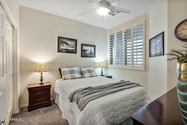 bedroom with ceiling fan, a closet, and carpet floors