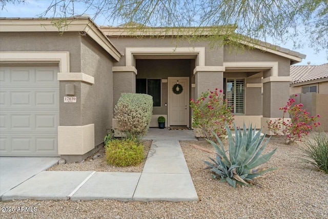 property entrance with a garage