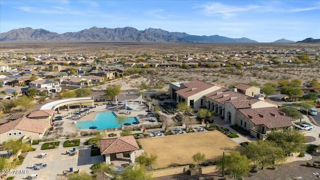 birds eye view of property featuring a mountain view